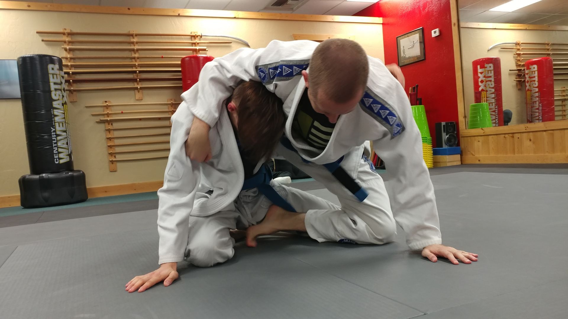 Adults training Brazilian Jiu Jitsu techniques at Centerline Jiu-Jitsu Chandler in Chandler, AZ.