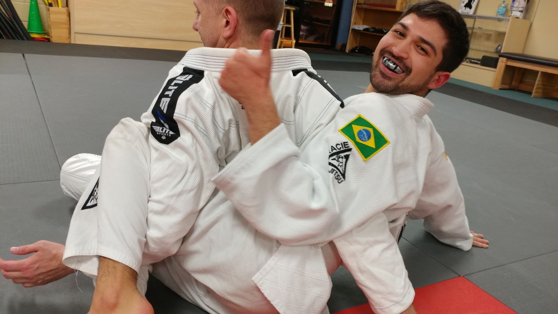 Adults practicing Brazilian Jiu Jitsu drills at Centerline Jiu-Jitsu Chandler in Chandler, AZ.
