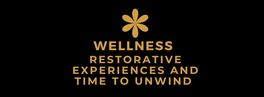 Gold wellness logo with flower icon and the words “WELLNESS RESTORATIVE EXPERIENCES AND TIME TO UNWIND”