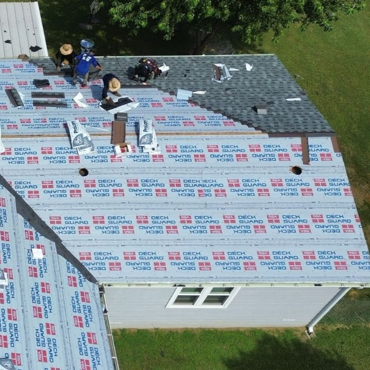 Roofers replacing roof