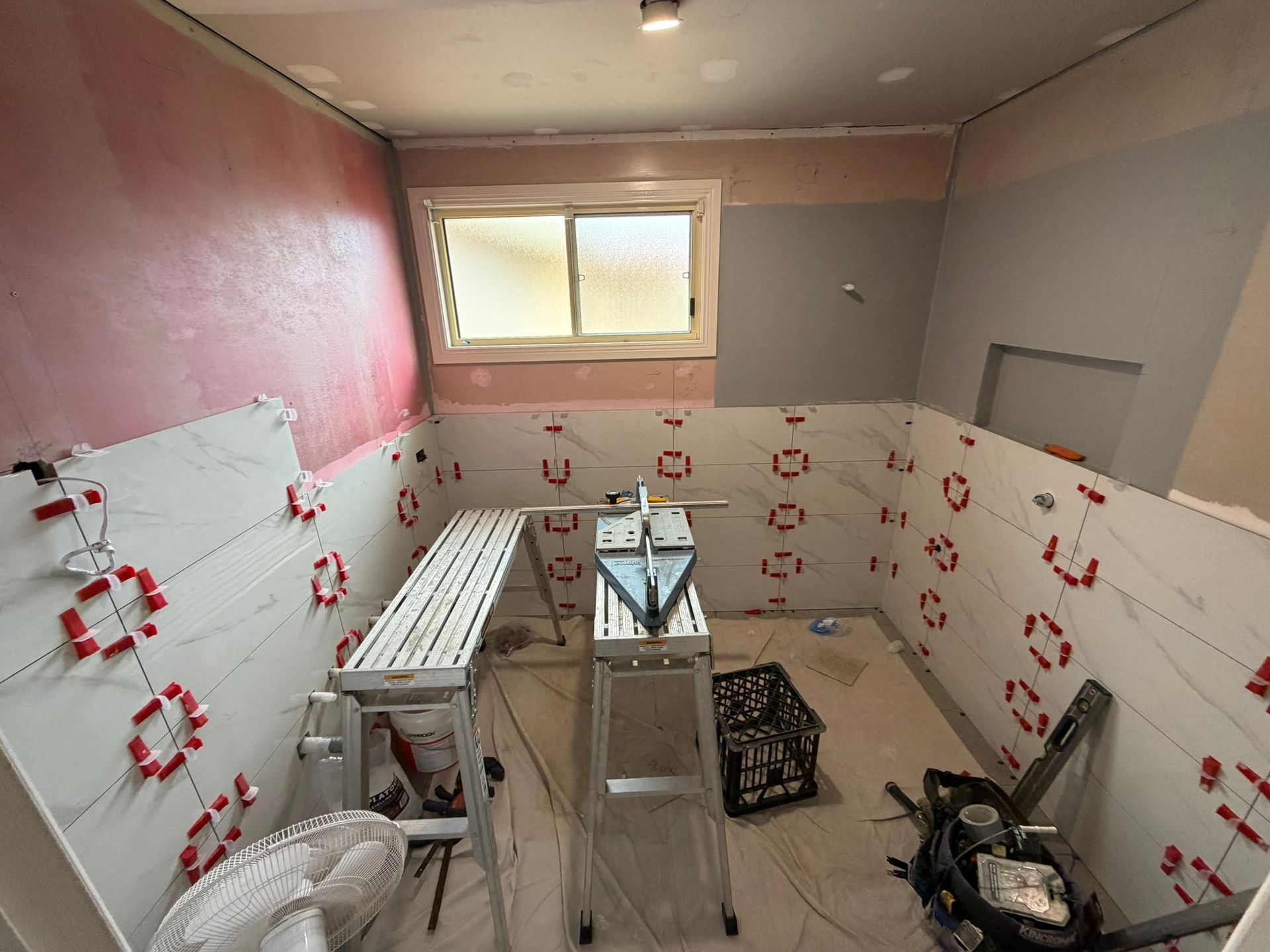 Pine Needles Erina bathroom wall tiling during construction