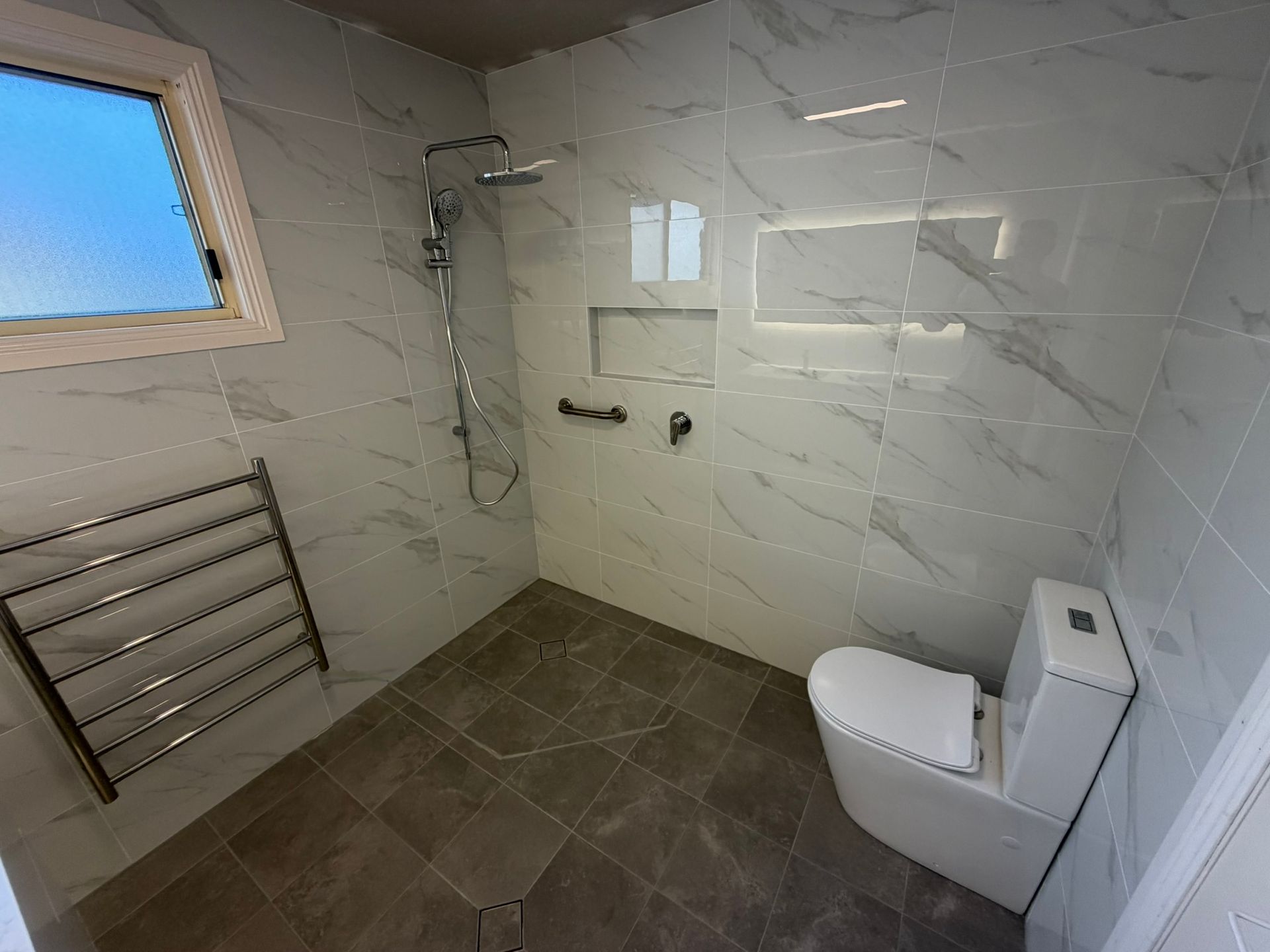 Pine Needles Erina bathroom finished shower and tiled wall
