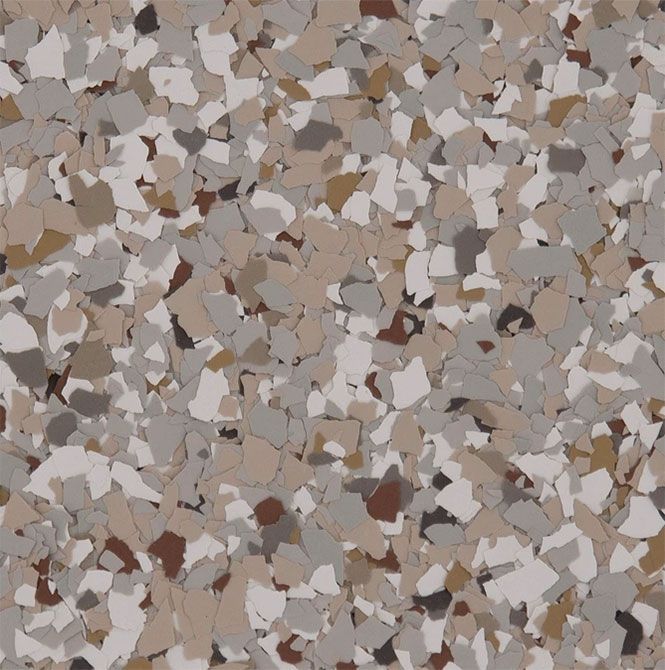 A multi-colored floor flake pattern with chips in shades of tan, brown, white, and gray.