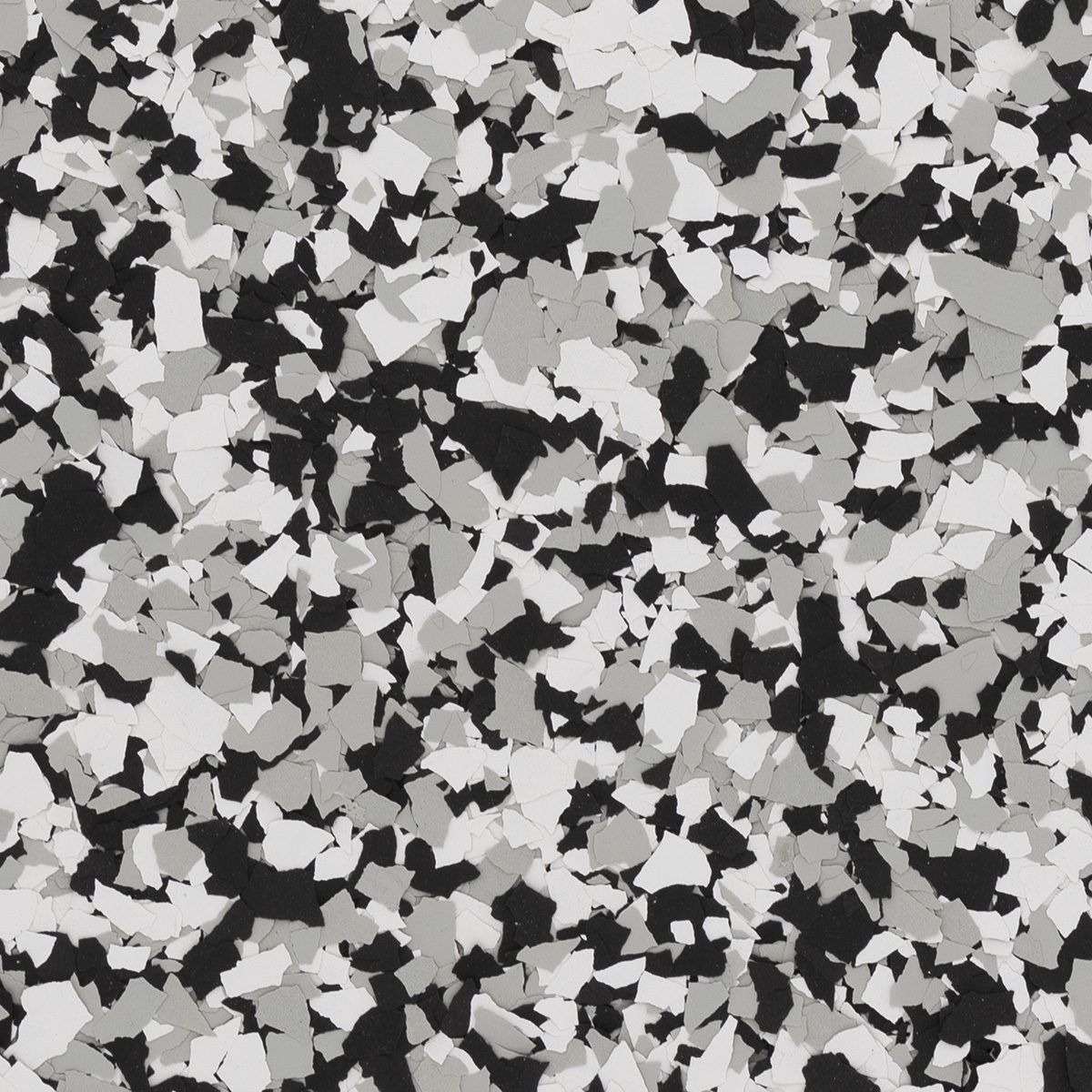 Black, white, and gray speckled abstract pattern resembling terrazzo or camouflage