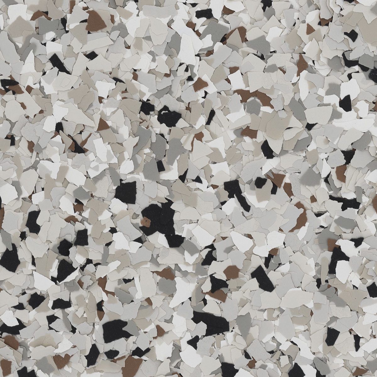 Gray and white speckled terrazzo surface with small black and brown chips