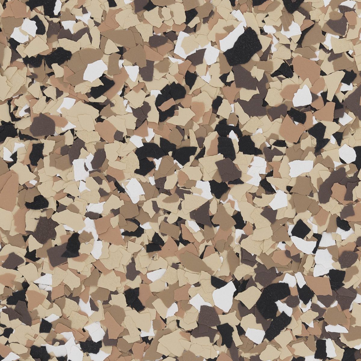 Close-up of beige, tan, black, and white speckled gravel or stone chips.