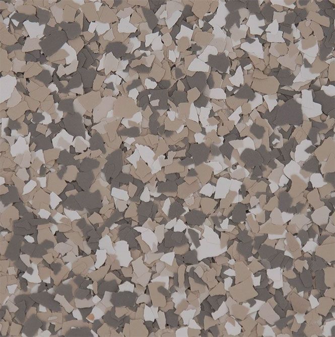 Decorative flooring texture with a blend of white, light tan, and dark gray paint chips.