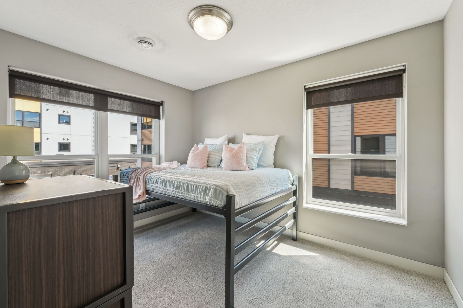 Bedroom of multistory townhomes in Minneapolis, MN with lofted bed