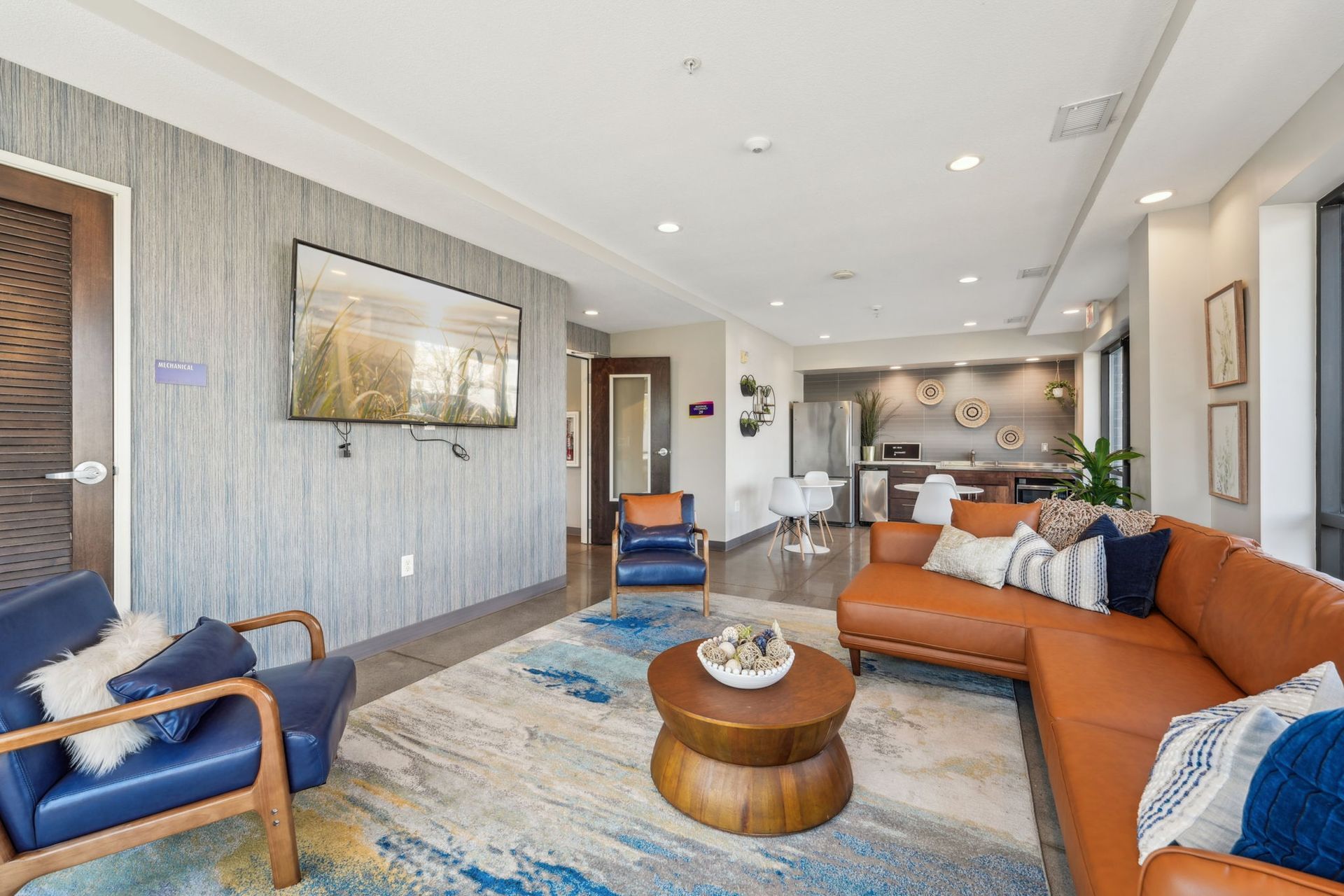 Community space with a kitchen at Spectrum Apartments in Minneapolis