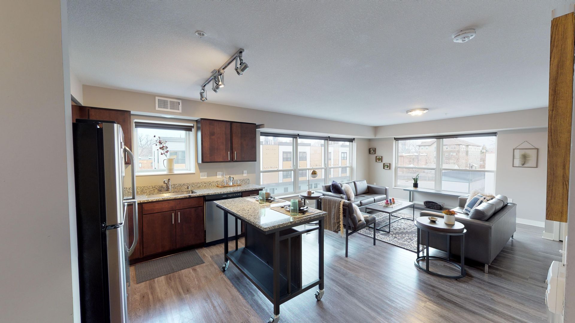 Open concept kitchen and living room at Spectrum apartments and townhomes in Minneapolis