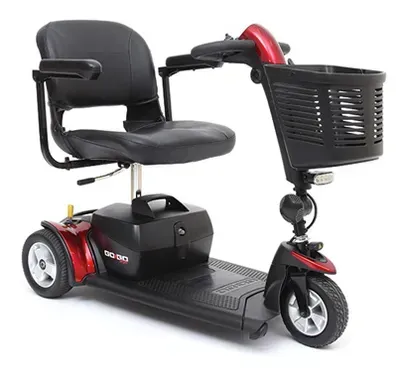 Black electric mobility scooter with seat, front basket, and three wheels