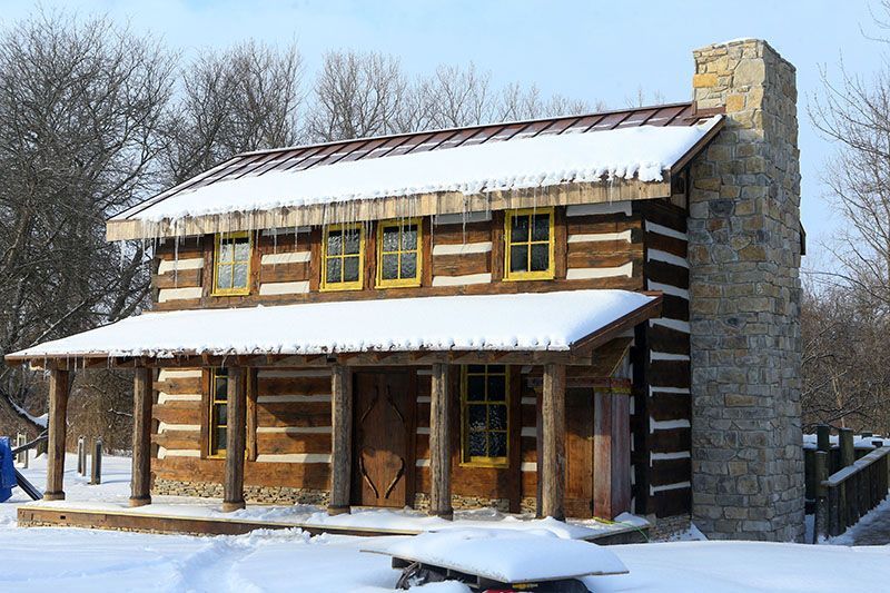 Rebuilt log cabin and chimney