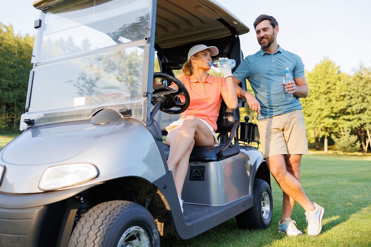 Couple on a golf cart