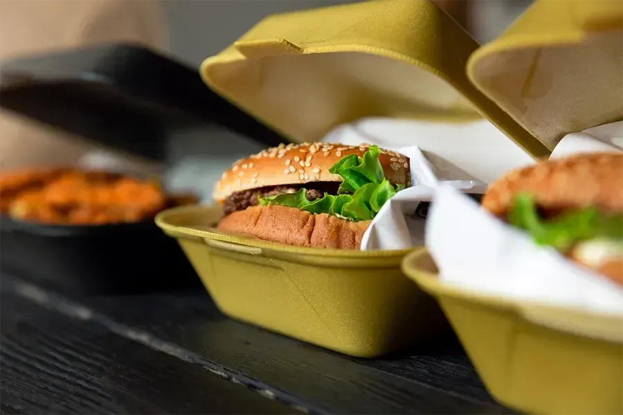 Cheeseburgers in a takeout box