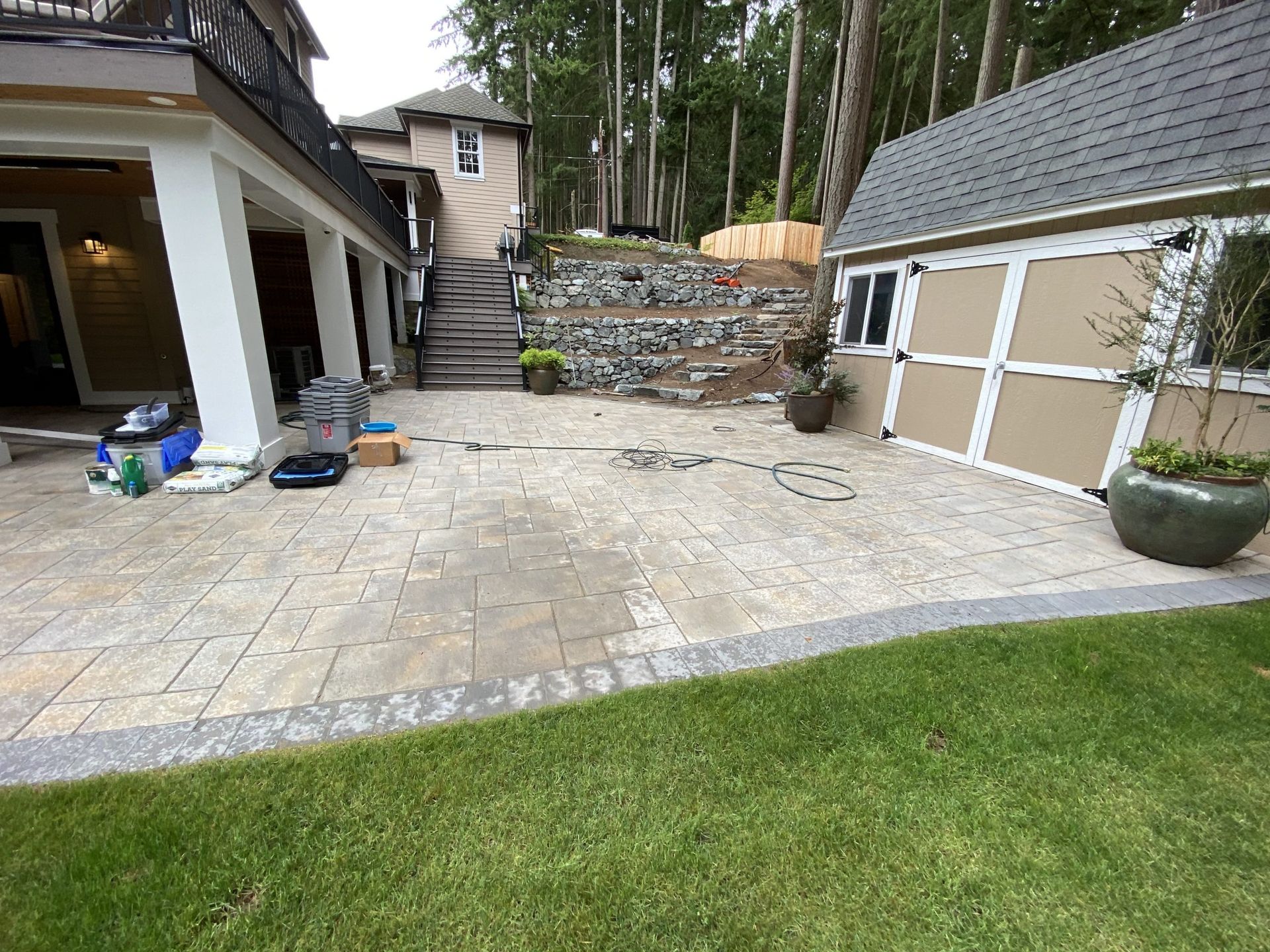 A house with a garage and a patio in Monroe, WA.