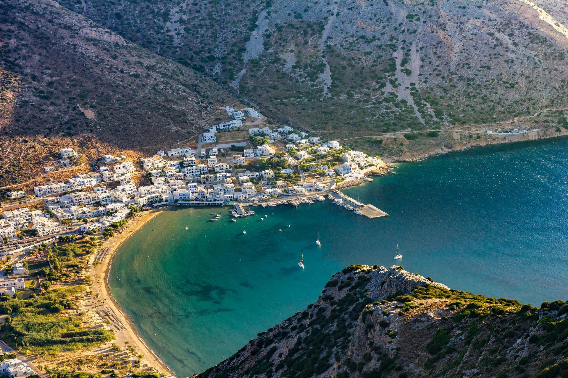 Greece, a beach and houses with a scenic view