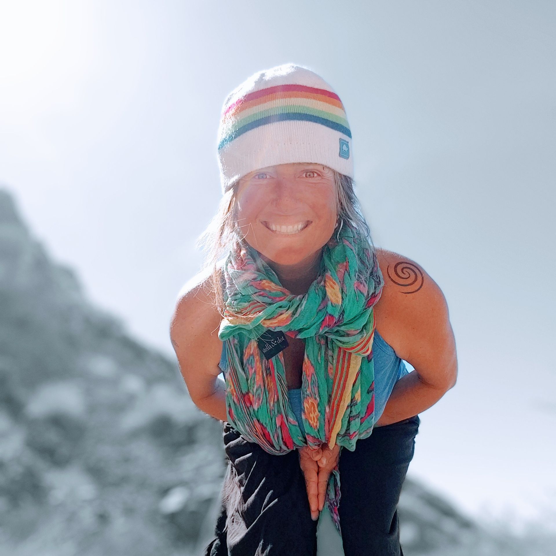 A smiling female backpacking guide.