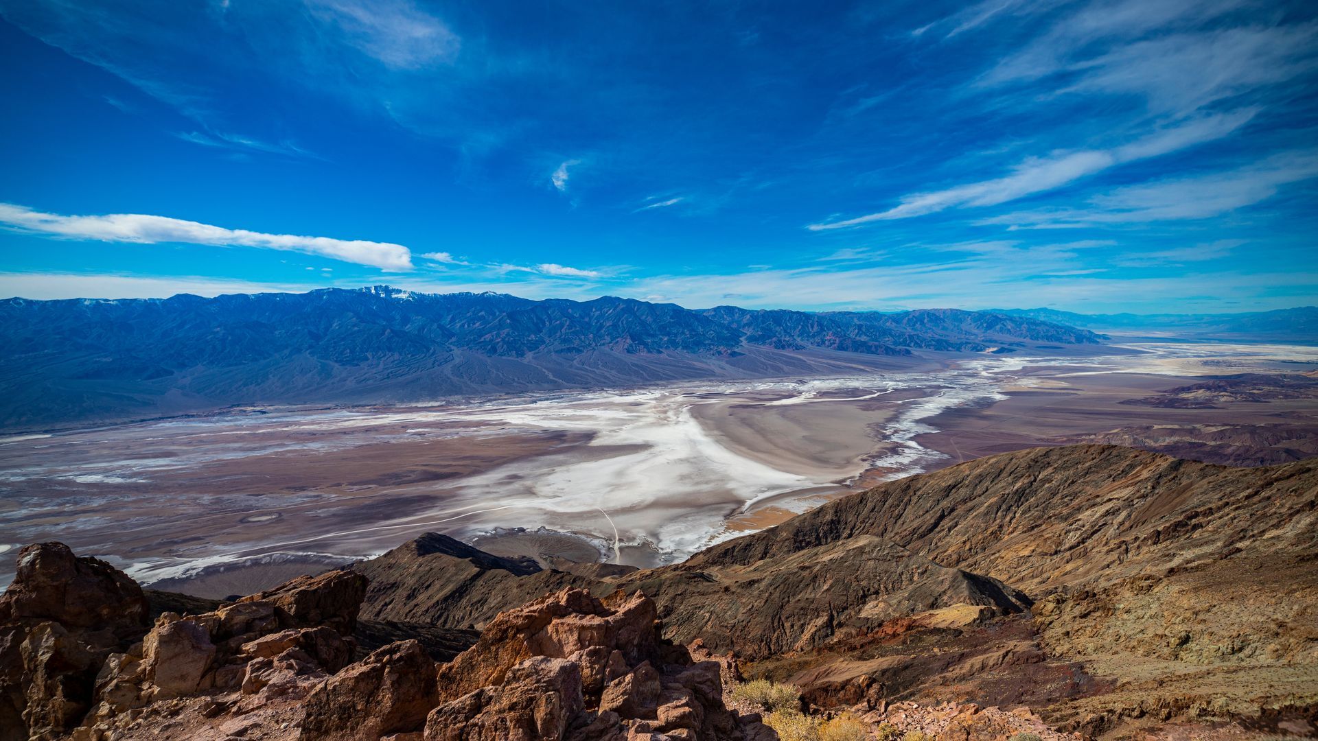 A view from above salt flats on a blue sky day