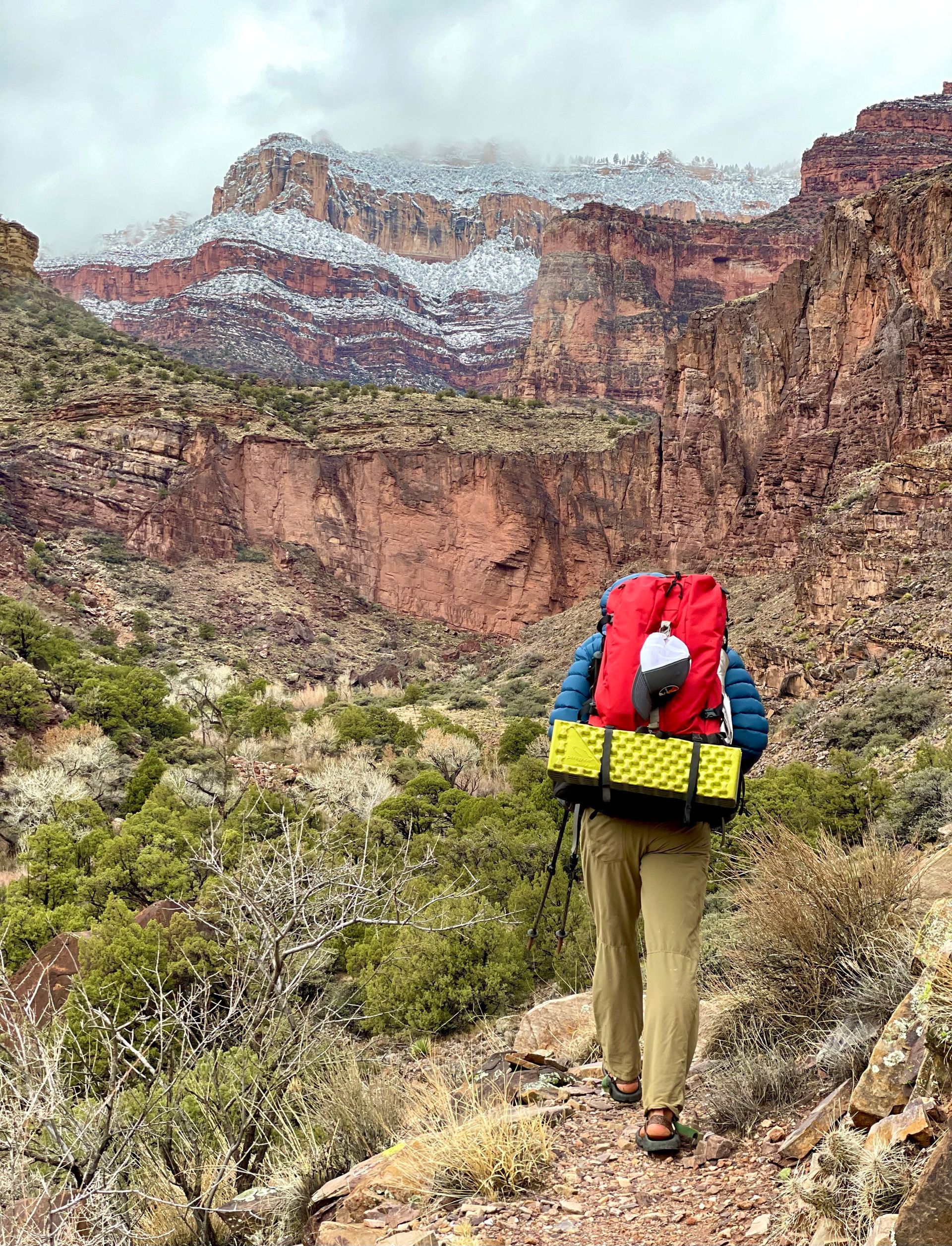 a person backpacking through the mountains