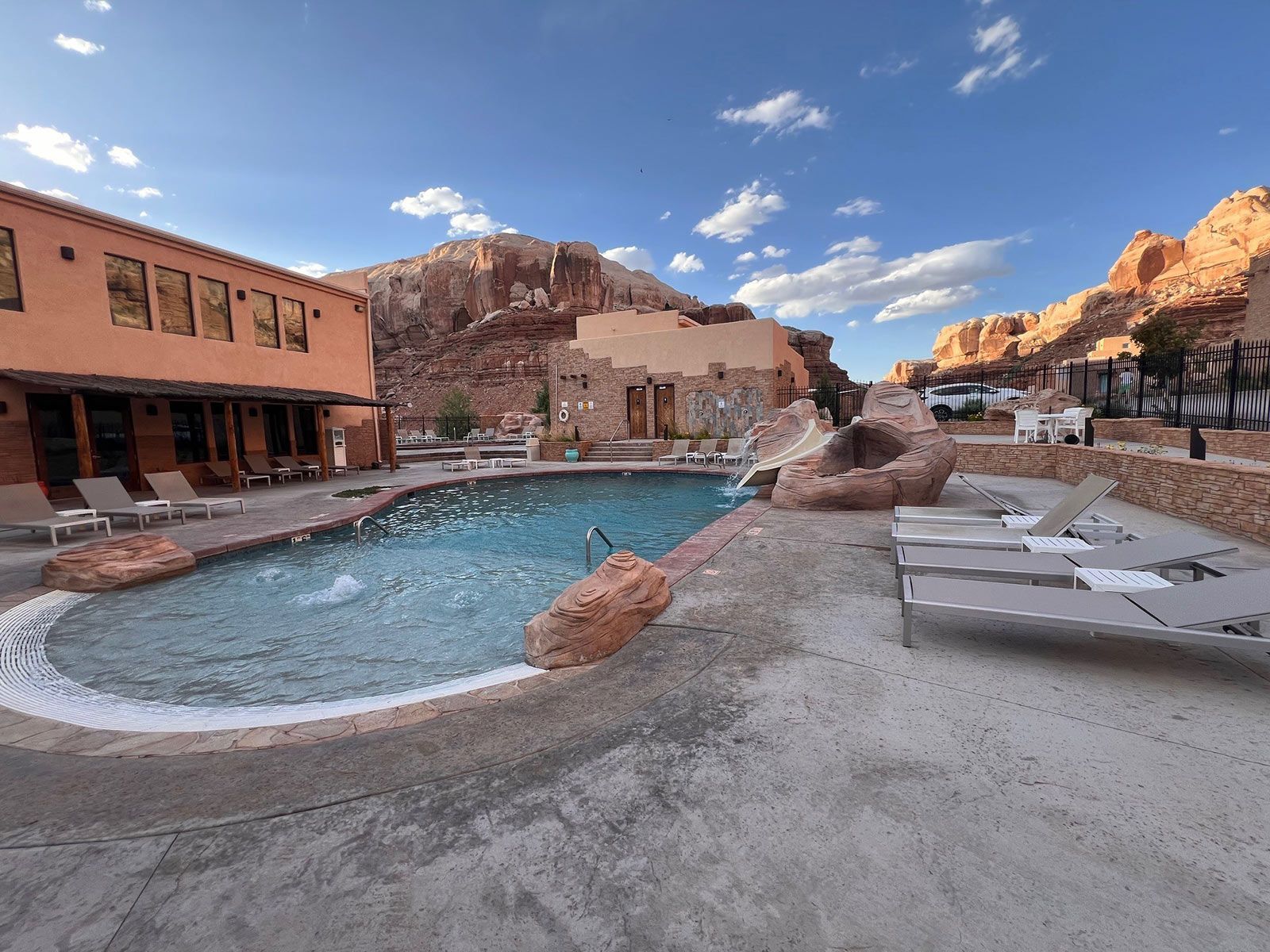 a lodge in the mountains with an indoor swimming pool