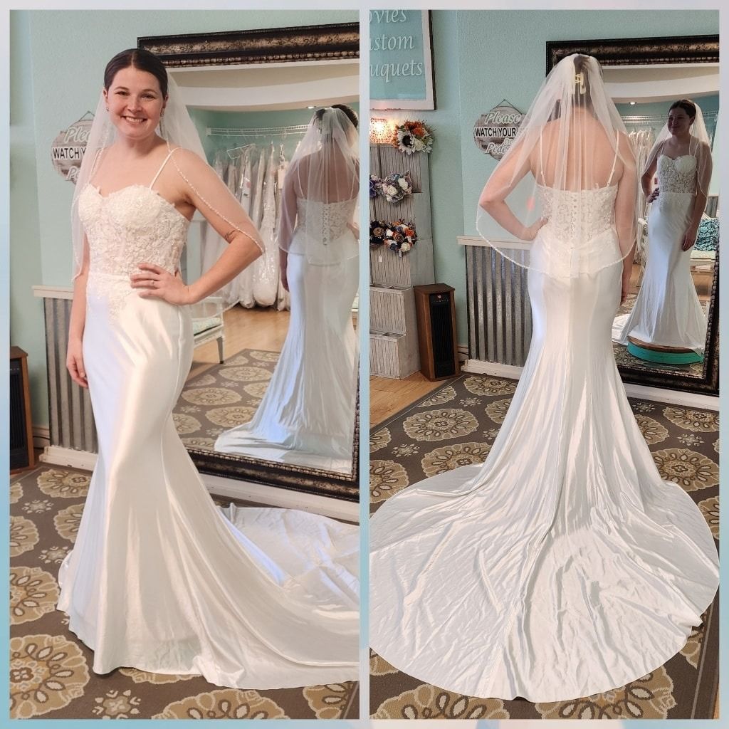 Bride in a white satin wedding gown with long train, shown front and back in a dressing room.