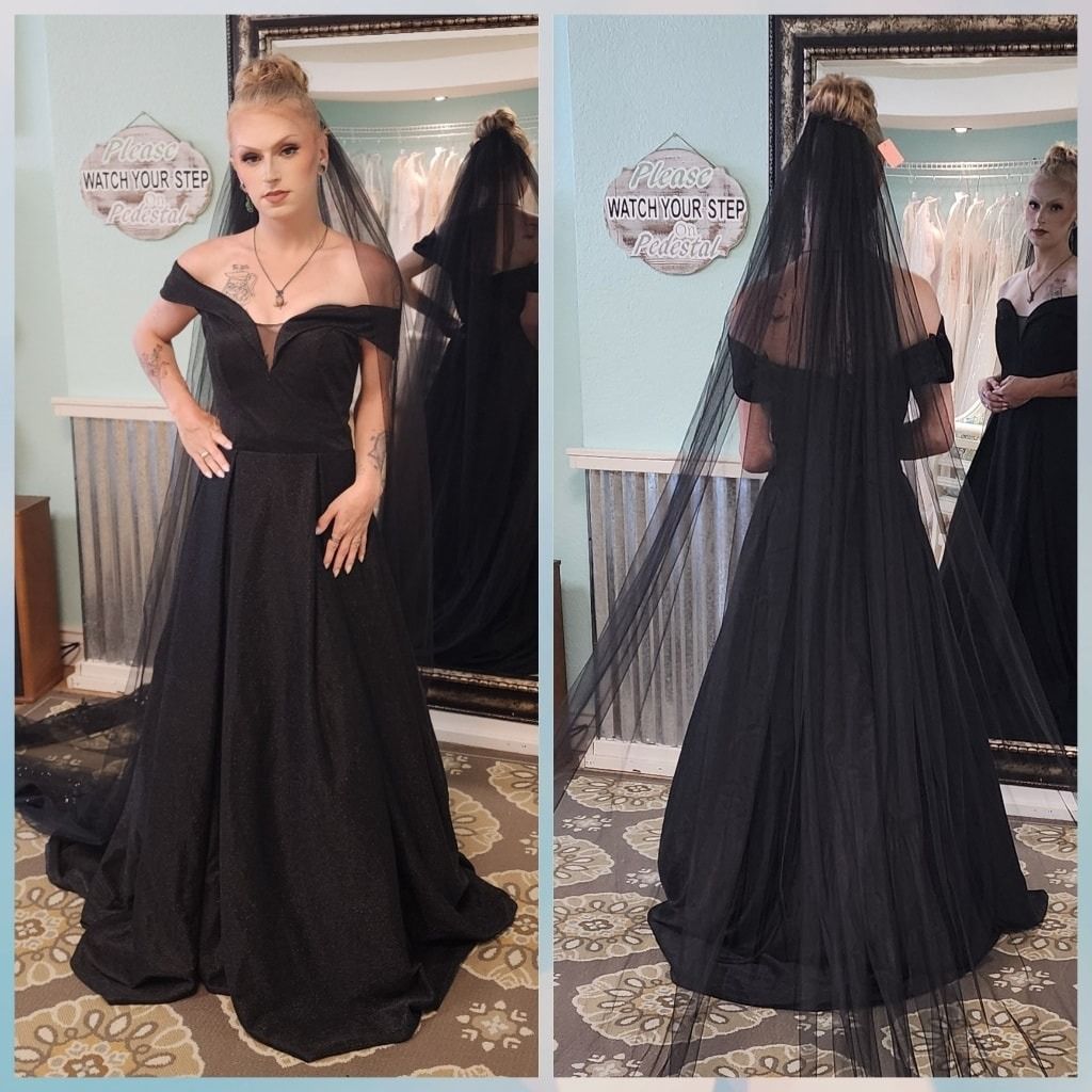 Woman in a black gown and veil posing in a mirrored dressing room, front and back views