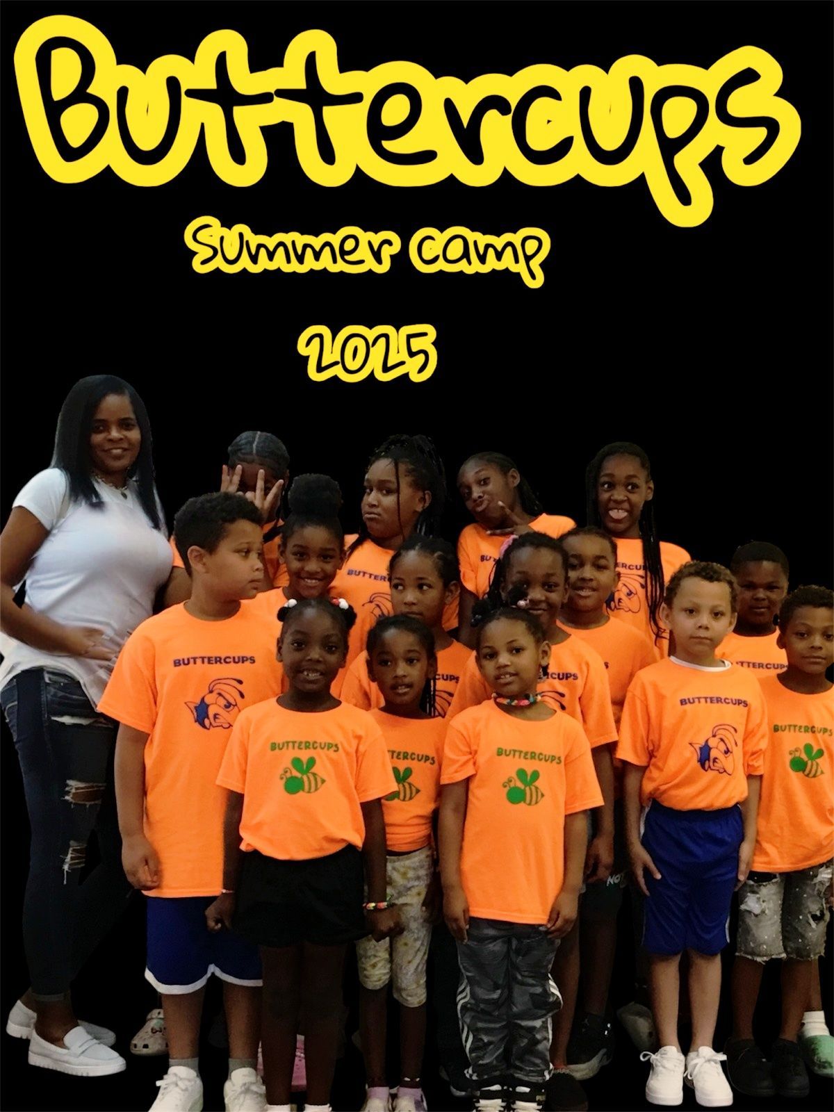 A group of children and an adult in Buttercups Summer Camp 2025 shirts pose for a photo against a black background.
