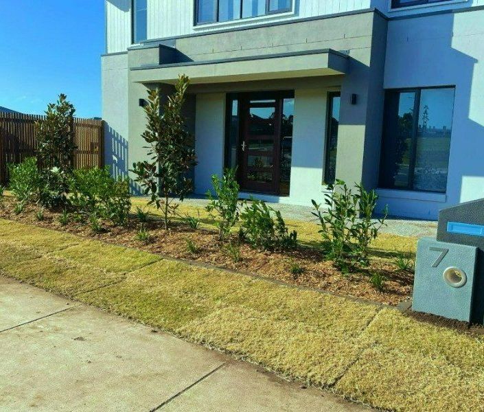 A House With the Number 7 on the Side of It — Turnscape Landscaping In Broadbeach, QLD