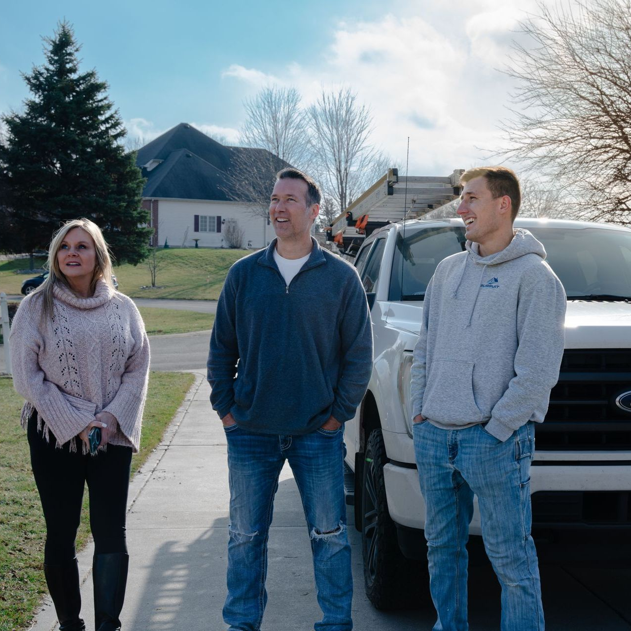 Pursuit Exterior owner talking with client