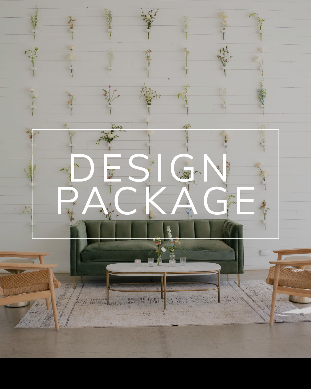 A green velvet sofa and wooden chairs in front of a white wall decorated with hanging dried flowers and text.