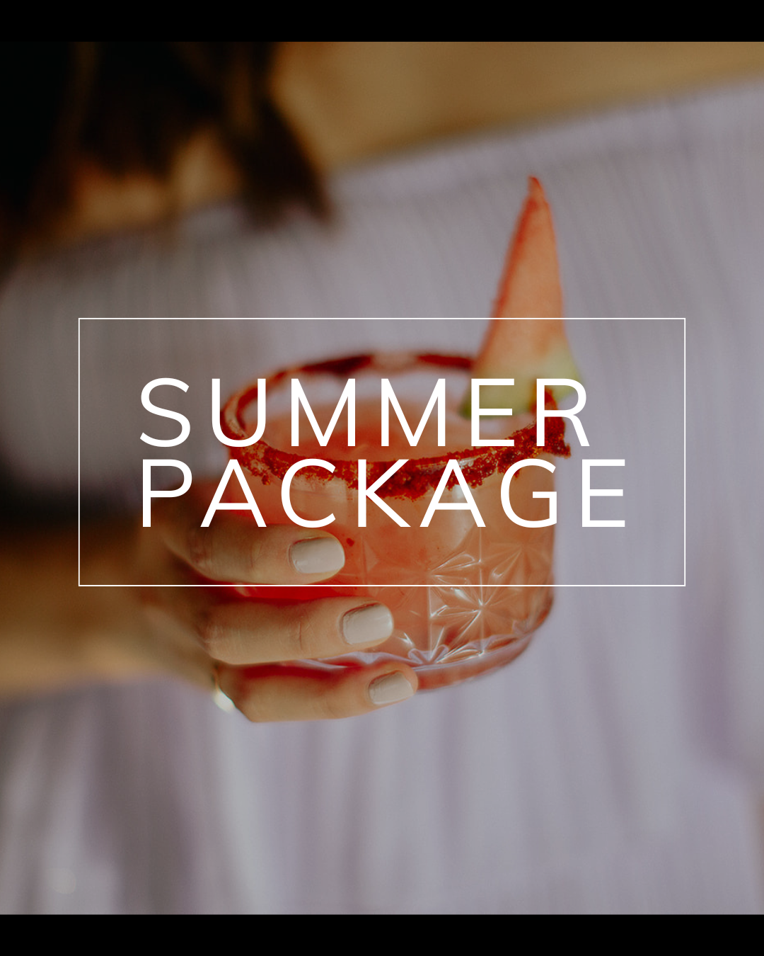 A hand holds a watermelon cocktail garnished with a fruit slice, overlaid with the text