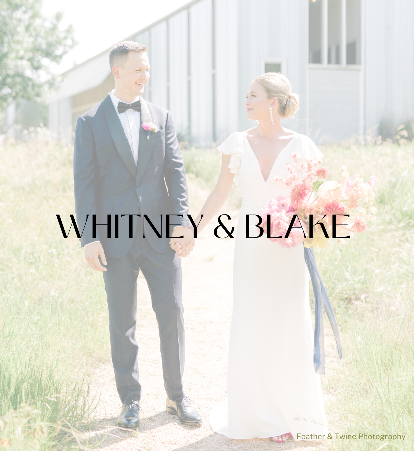 A couple holds hands walking through a grassy field in front of a white building. The text 