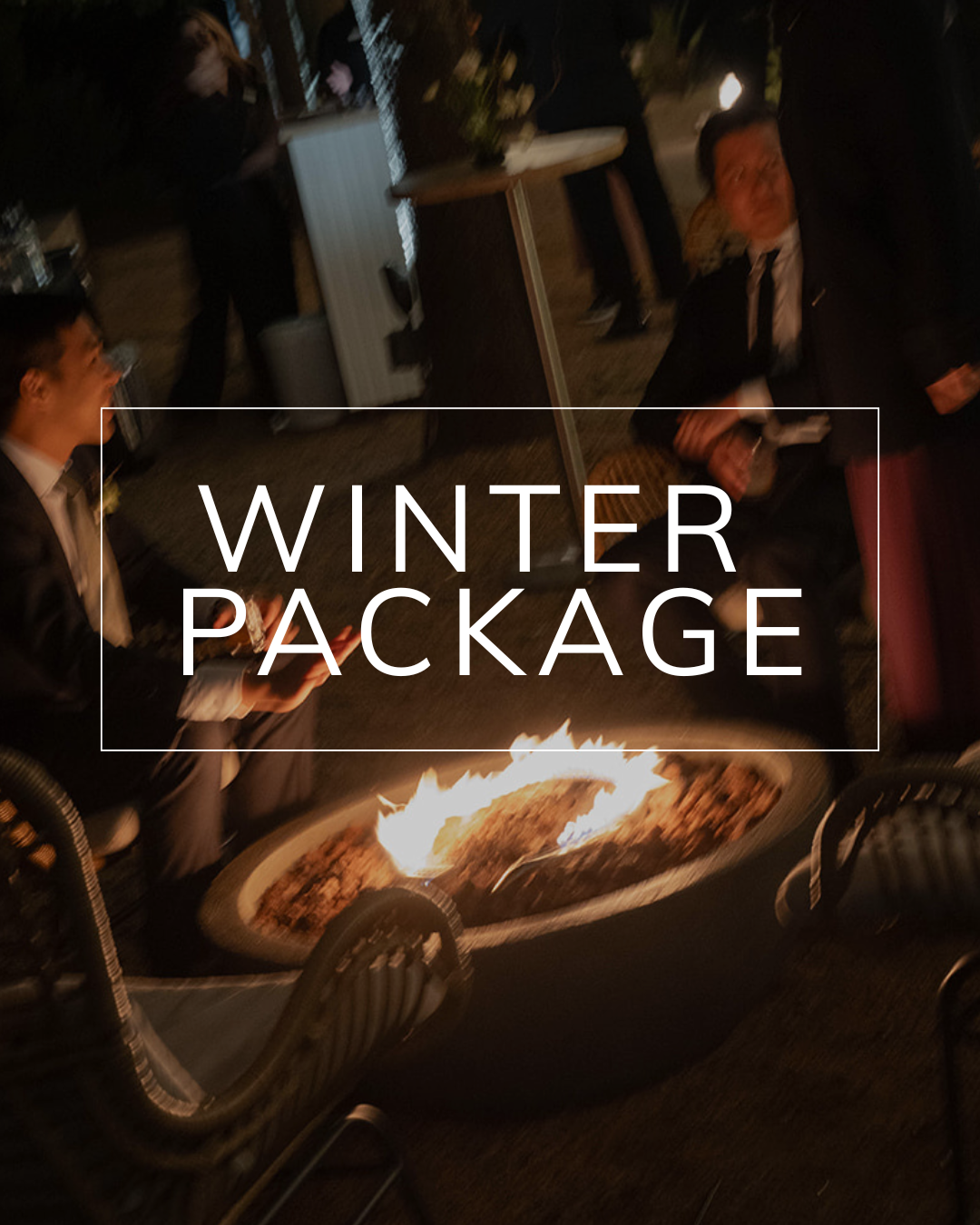 People gather around a glowing circular fire pit at night, with the text