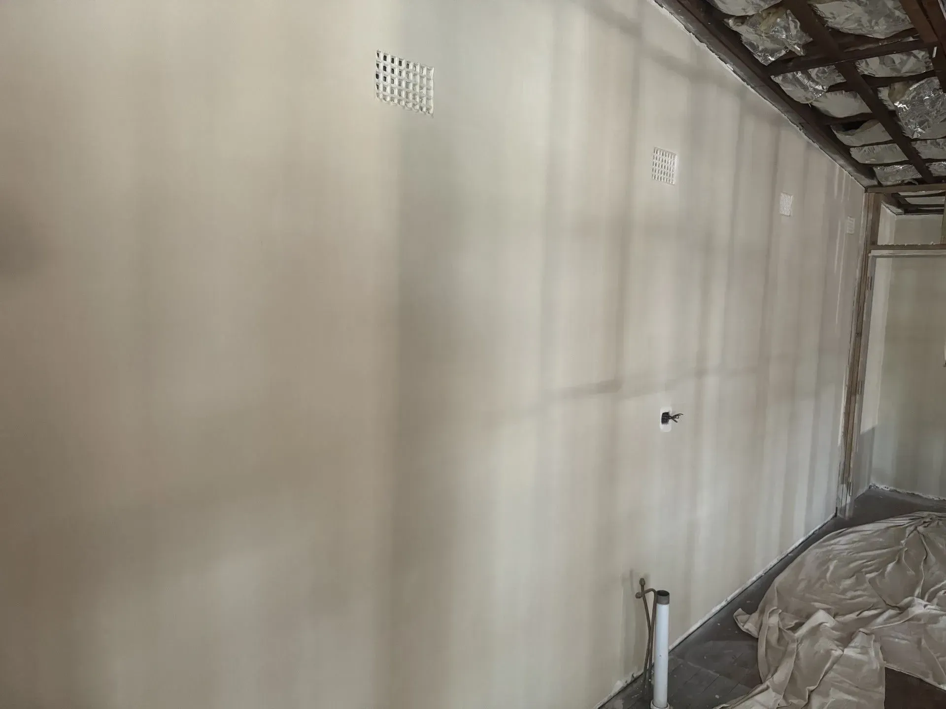 Interior Wall with Light Beige Plaster — Completely Plastered North Coast in Byron Bay, NSW