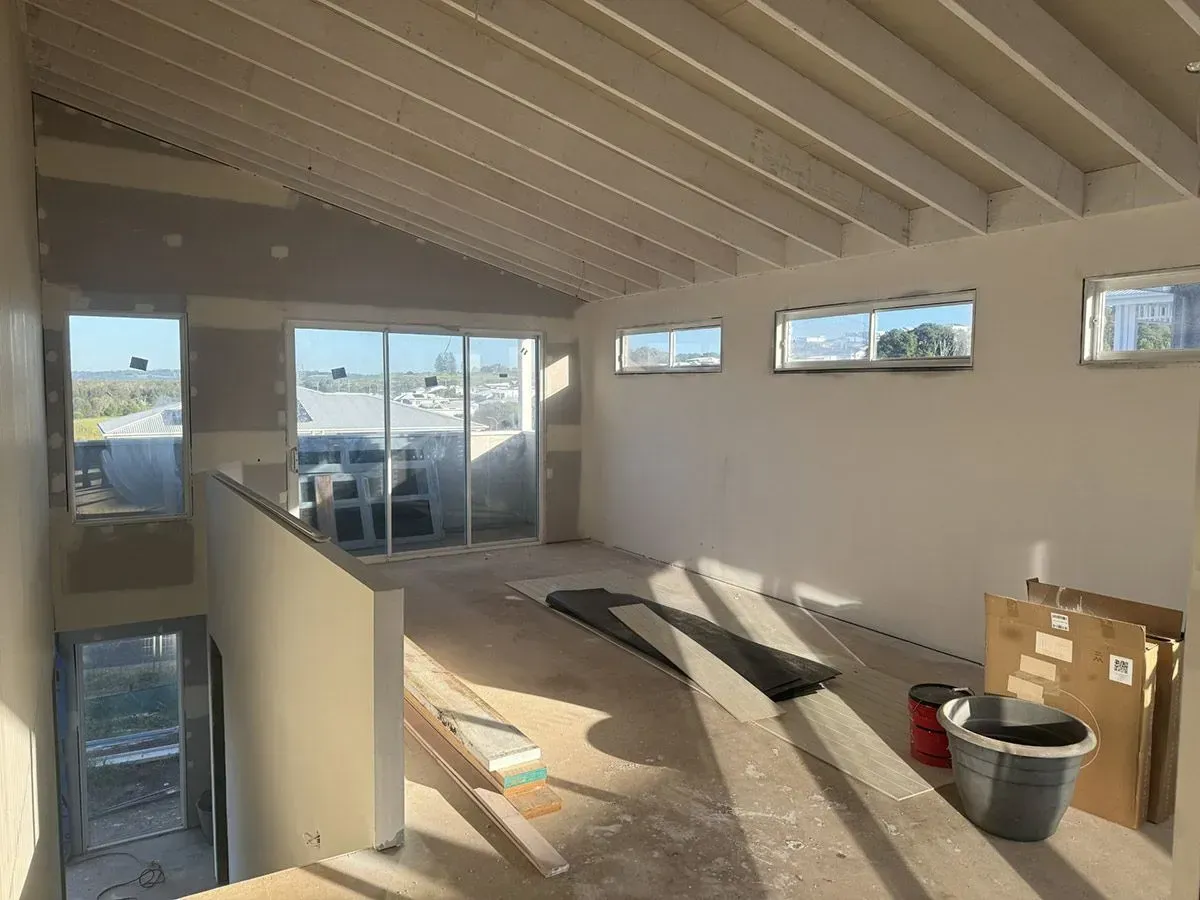 Interior View of Unfinished Room with Sloped Ceiling — Completely Plastered North Coast in Byron Bay, NSW