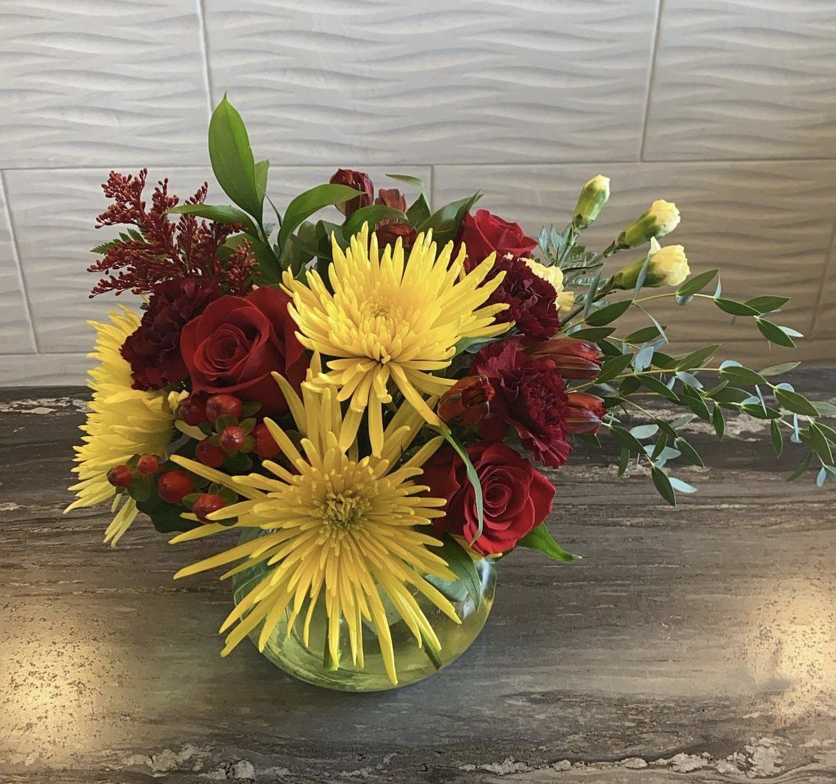 Small yellow and red floral arrangement