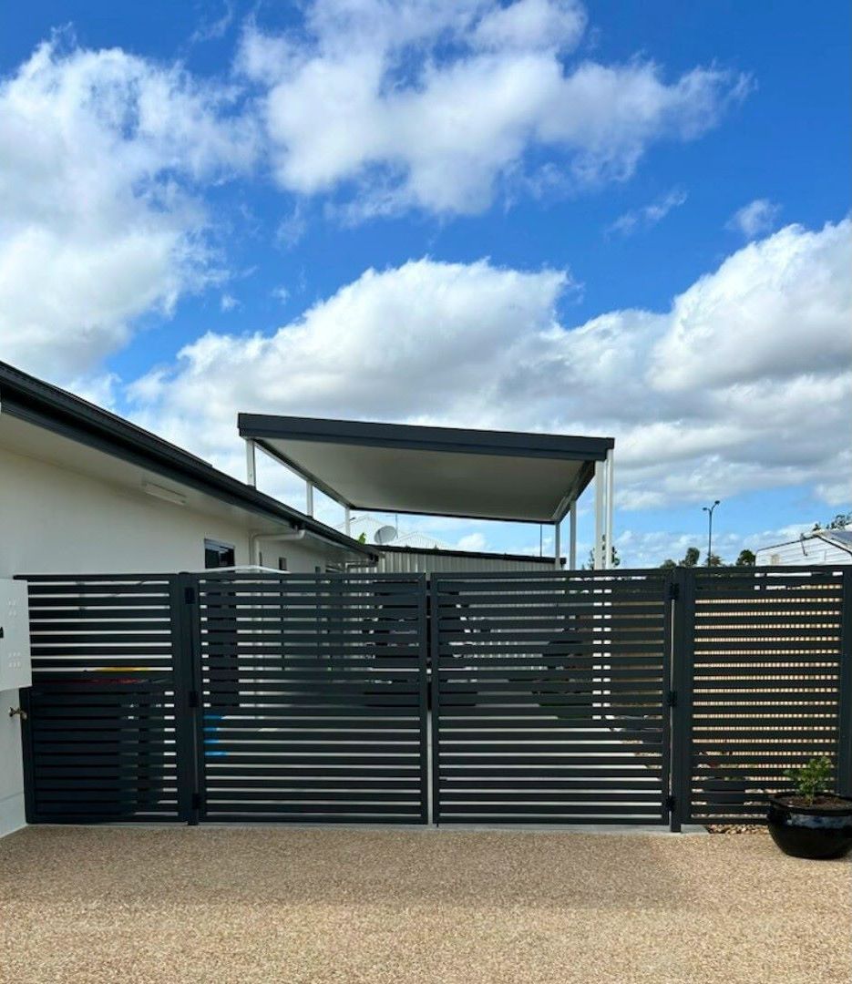 A Black Gate With a Canopy Over It is in Front of a House — — Pro-Jax Pty Ltd in North Queensland, QLD