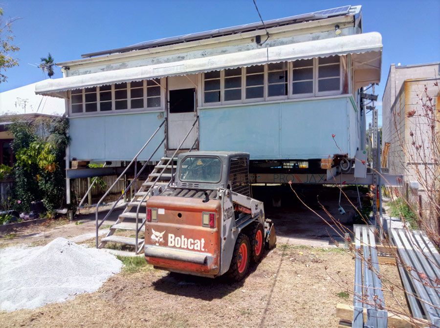 A Bobcat is Parked in Front of a House Under Construction  — Pro-Jax Pty Ltd in Hughenden, QLD