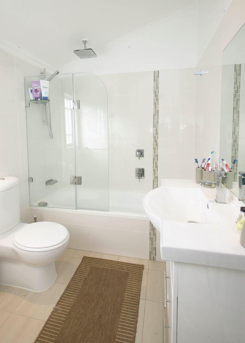 A Bathroom With a Toilet, Sink, Bathtub and Shower — Pro-Jax Pty Ltd in Bohle, QLD