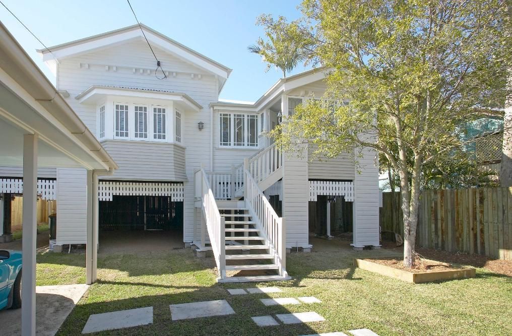 A White House With Stairs Leading Up to the Second Floor — Pro-Jax Pty Ltd in Bohle, QLD