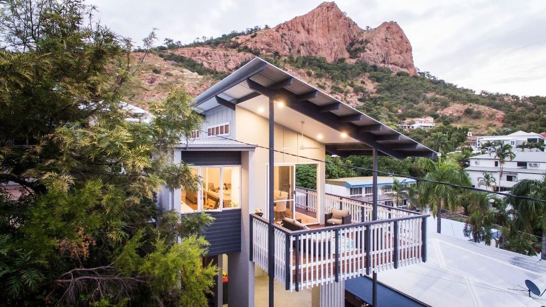 An Aerial View of a House With a Mountain in the Background — Pro-Jax Pty Ltd in Bohle, QLD
