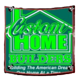 Custom Home Builders sign in green and white with “Building the American Dream” tagline