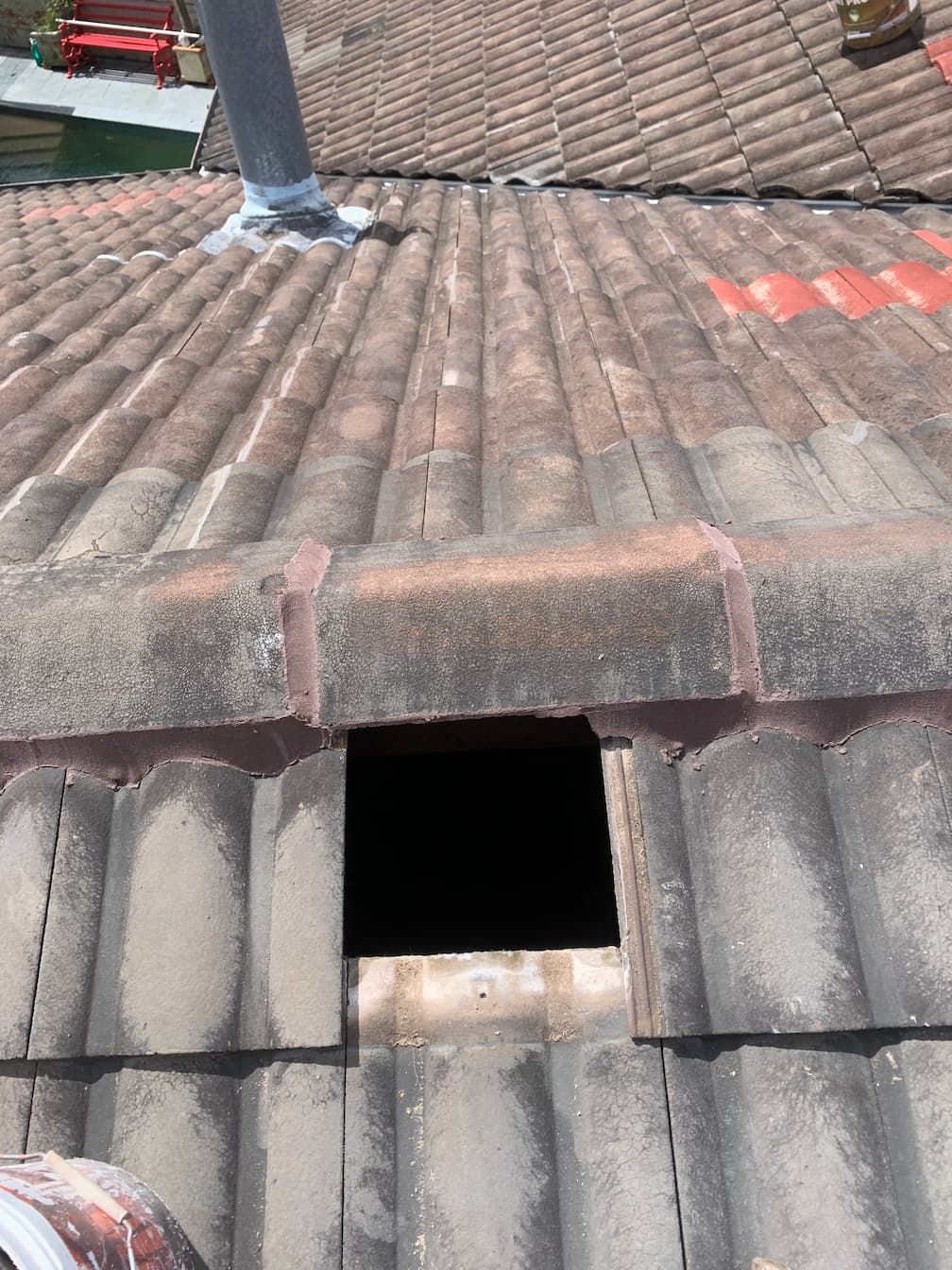 A roof with a hole in the middle of it