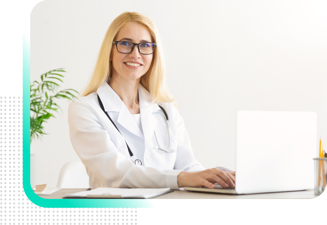 A group of doctors are looking at a computer screen.