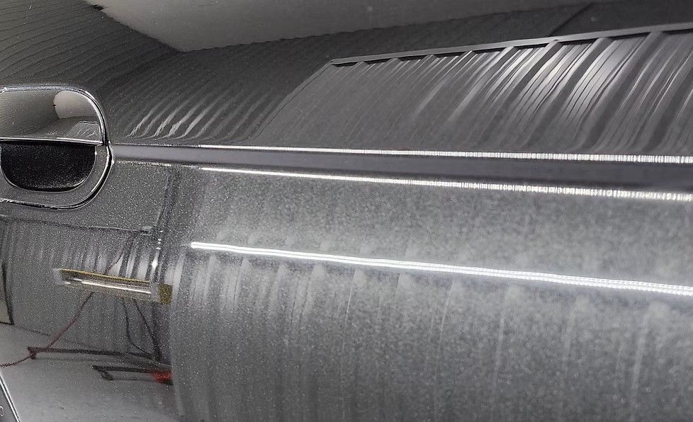Metal ductwork in a corrugated building.