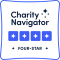 Charity Navigator Four-Star award badge in blue and white.