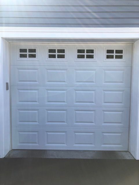 White garage door with window details