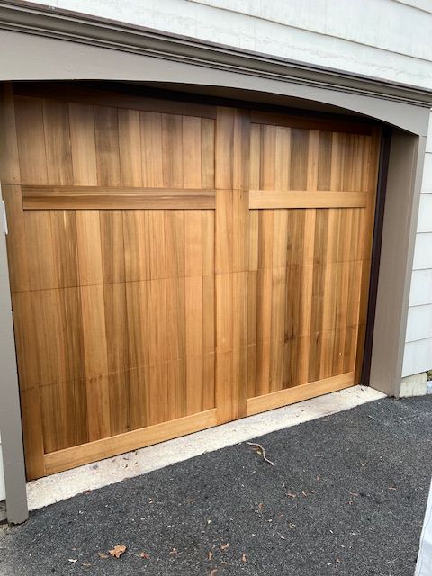 Wooden garage door installation