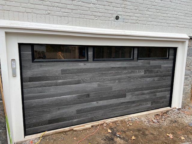 Gray wood affect garage door