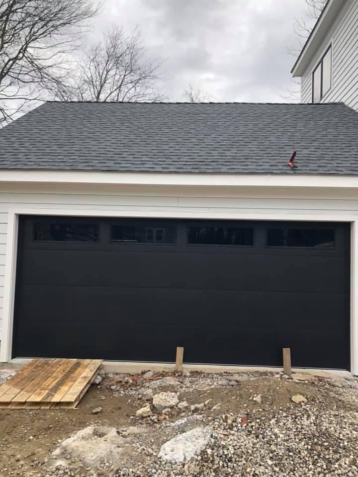 Black garage door installation